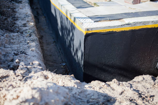 Professional Interior Drainage System technician working in Freedom, IN